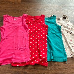 Lot of 4 different tank tops. 3 tops are L and 1 top is a M.